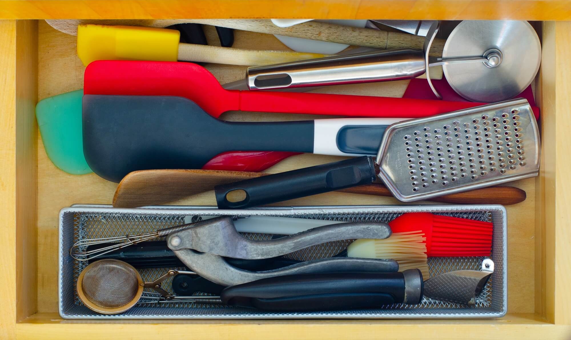 Duplicate spatulas in kitchen drawer